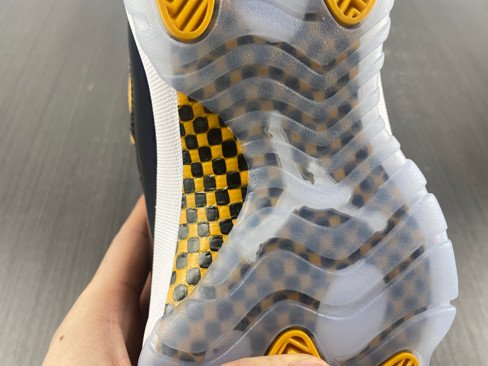 Air Jordan 11 Dark Blue and Yellow