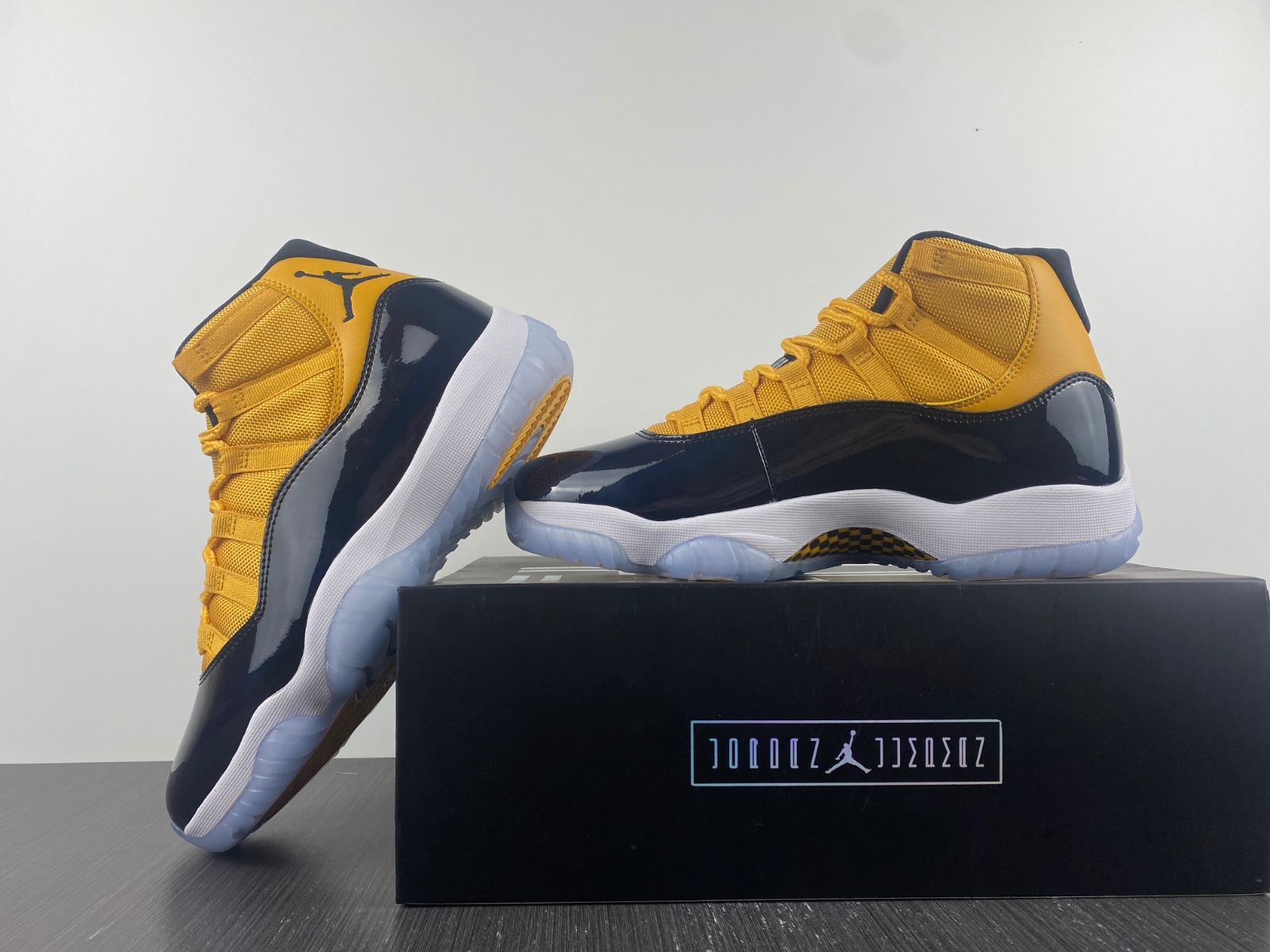 Air Jordan 11 Dark Blue and Yellow