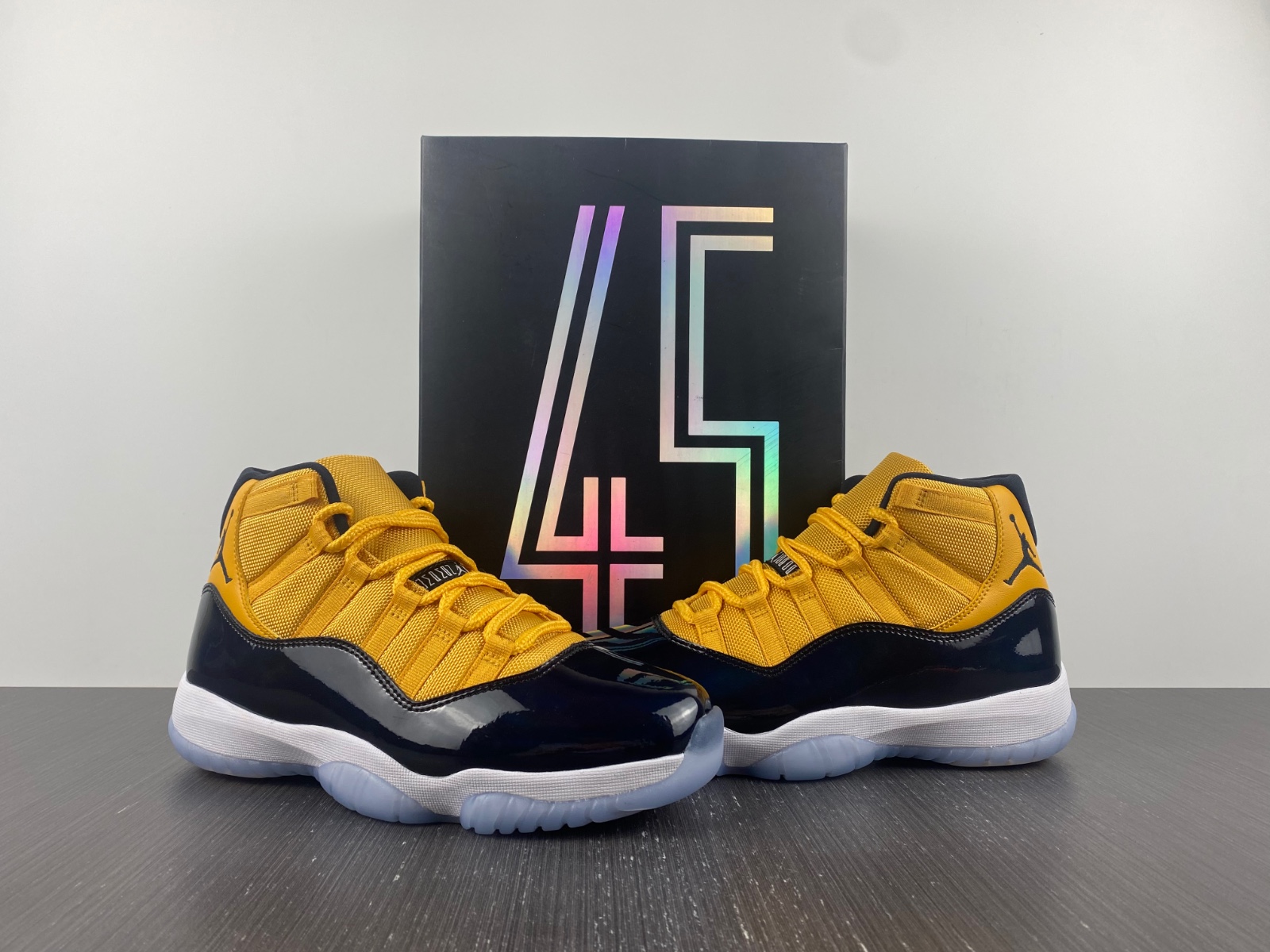 Air Jordan 11 Dark Blue and Yellow