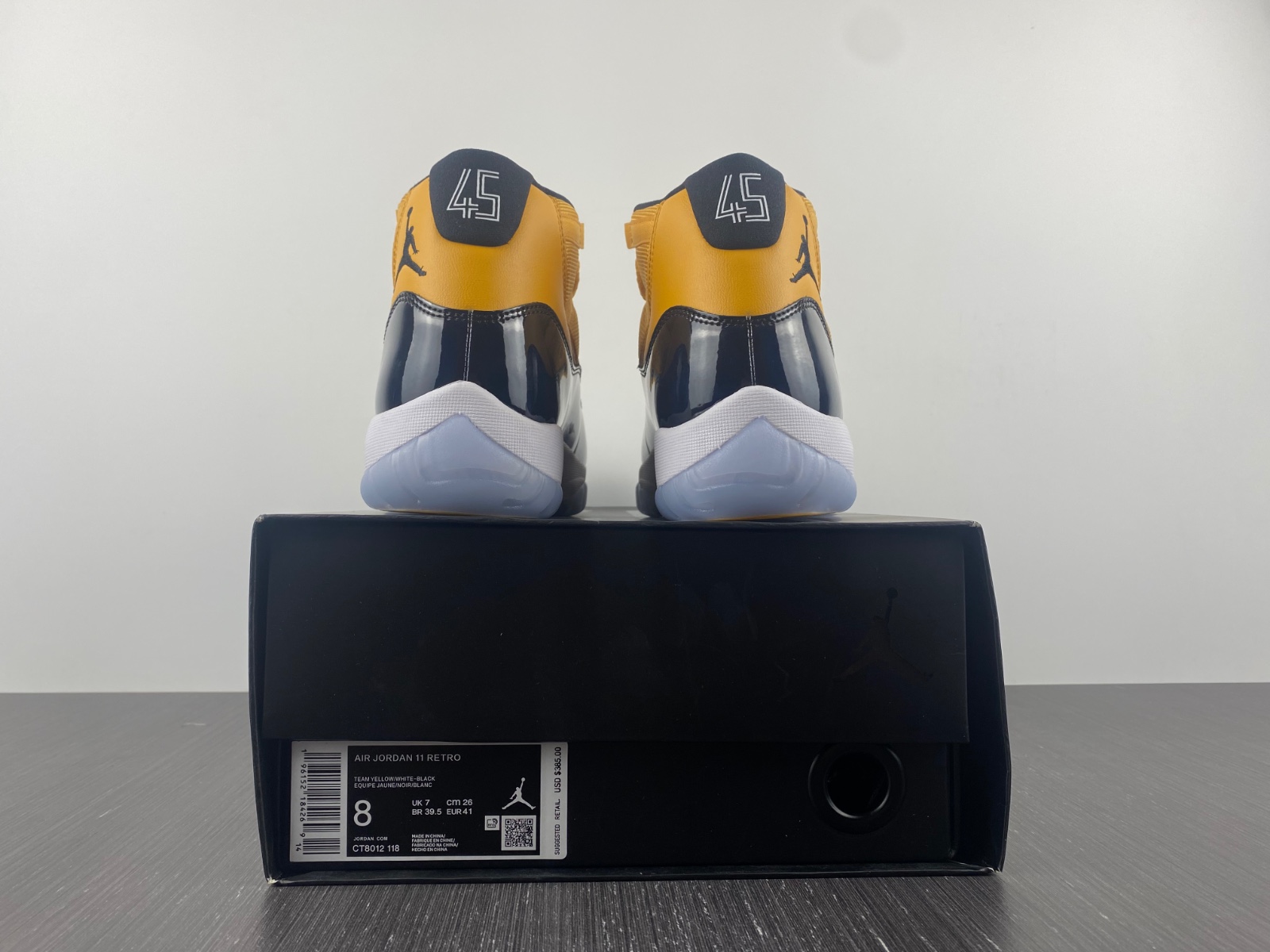 Air Jordan 11 Dark Blue and Yellow