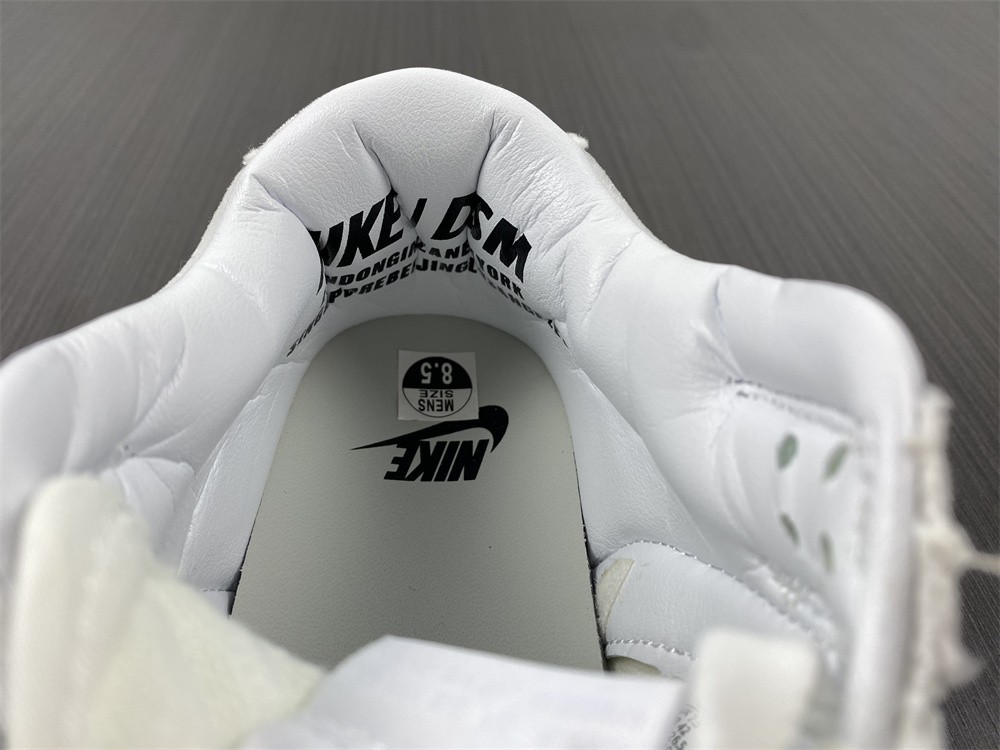 Dover Street Market x Nike Dunk Low Triple White