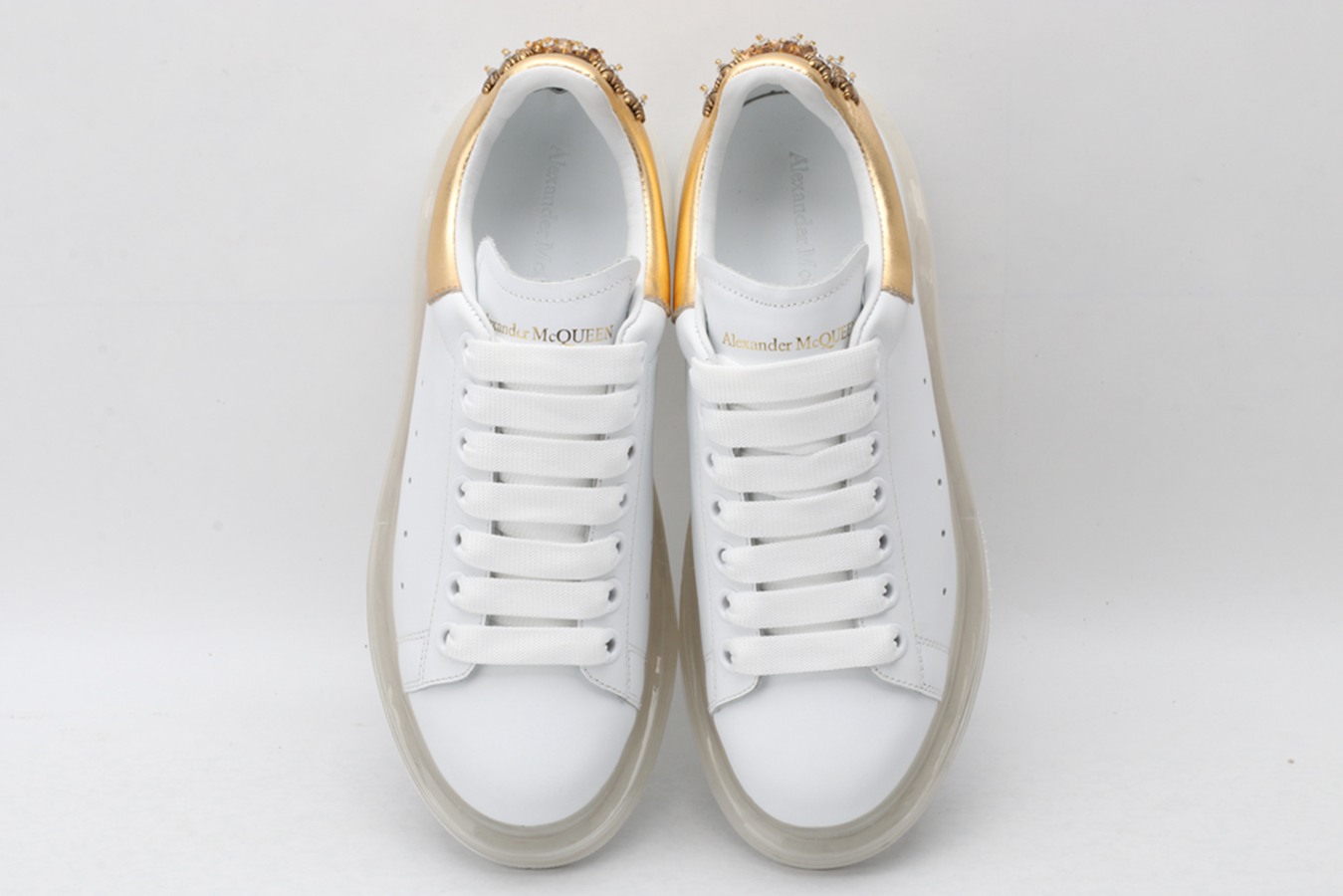 AMQ oversized sneakers with gold heel