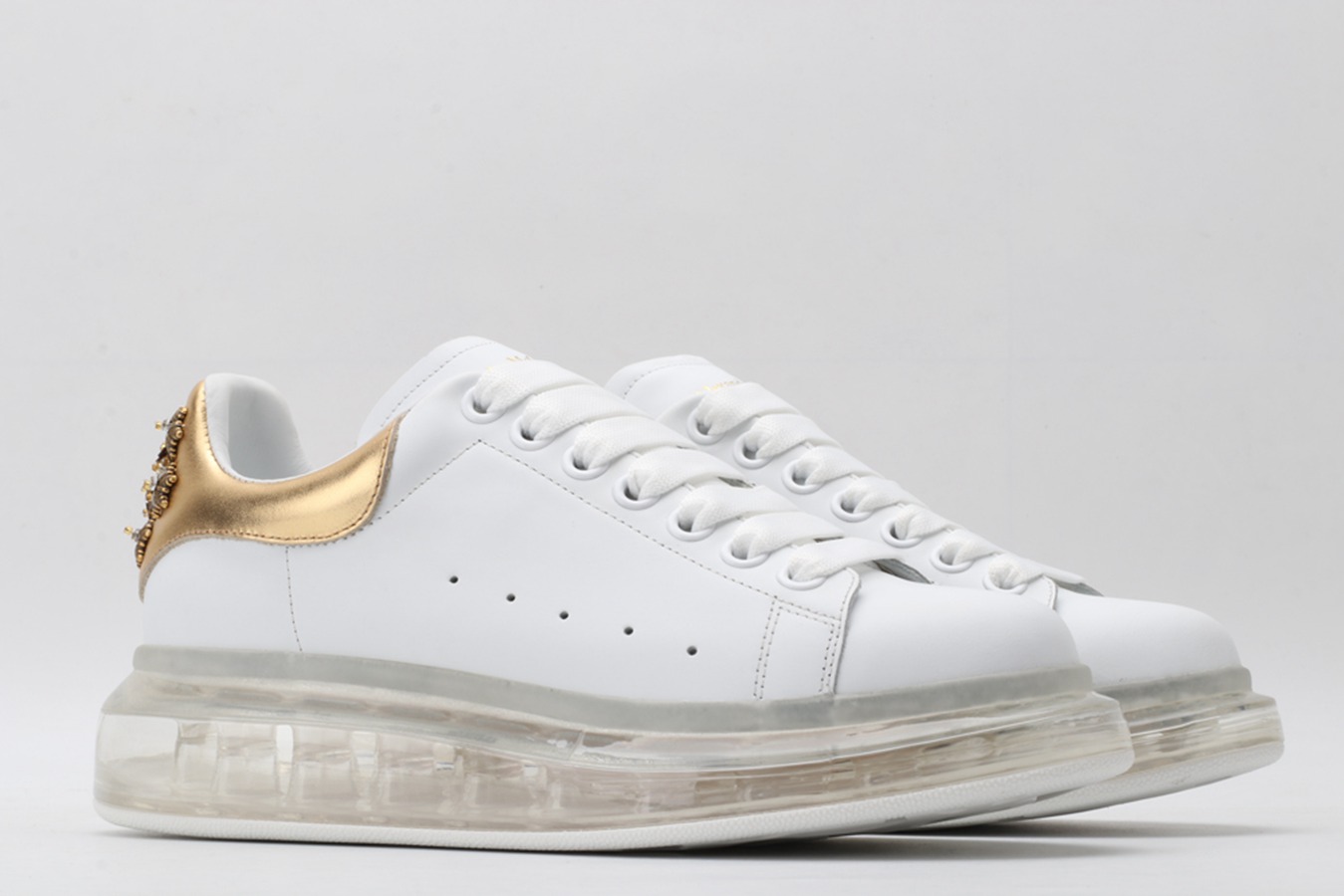 AMQ oversized sneakers with gold heel