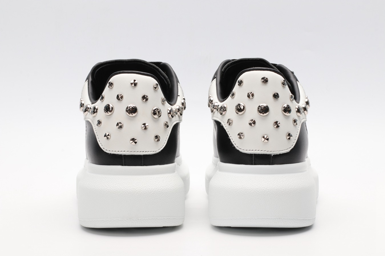 AMQ Black calf leather lace-up sneaker with siL*Ver-finished hammered stud