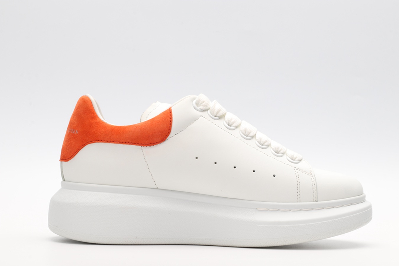 AMQ OVERSIZED SNEAKER with orange heel