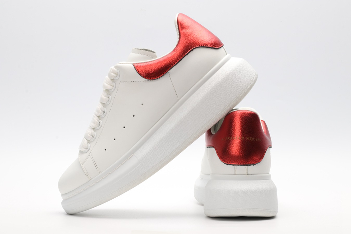 AMQ red foil embellished chunky leather sneakers
