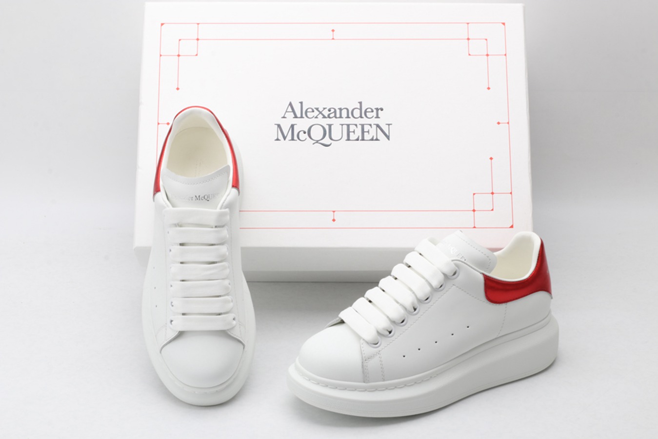 AMQ red foil embellished chunky leather sneakers
