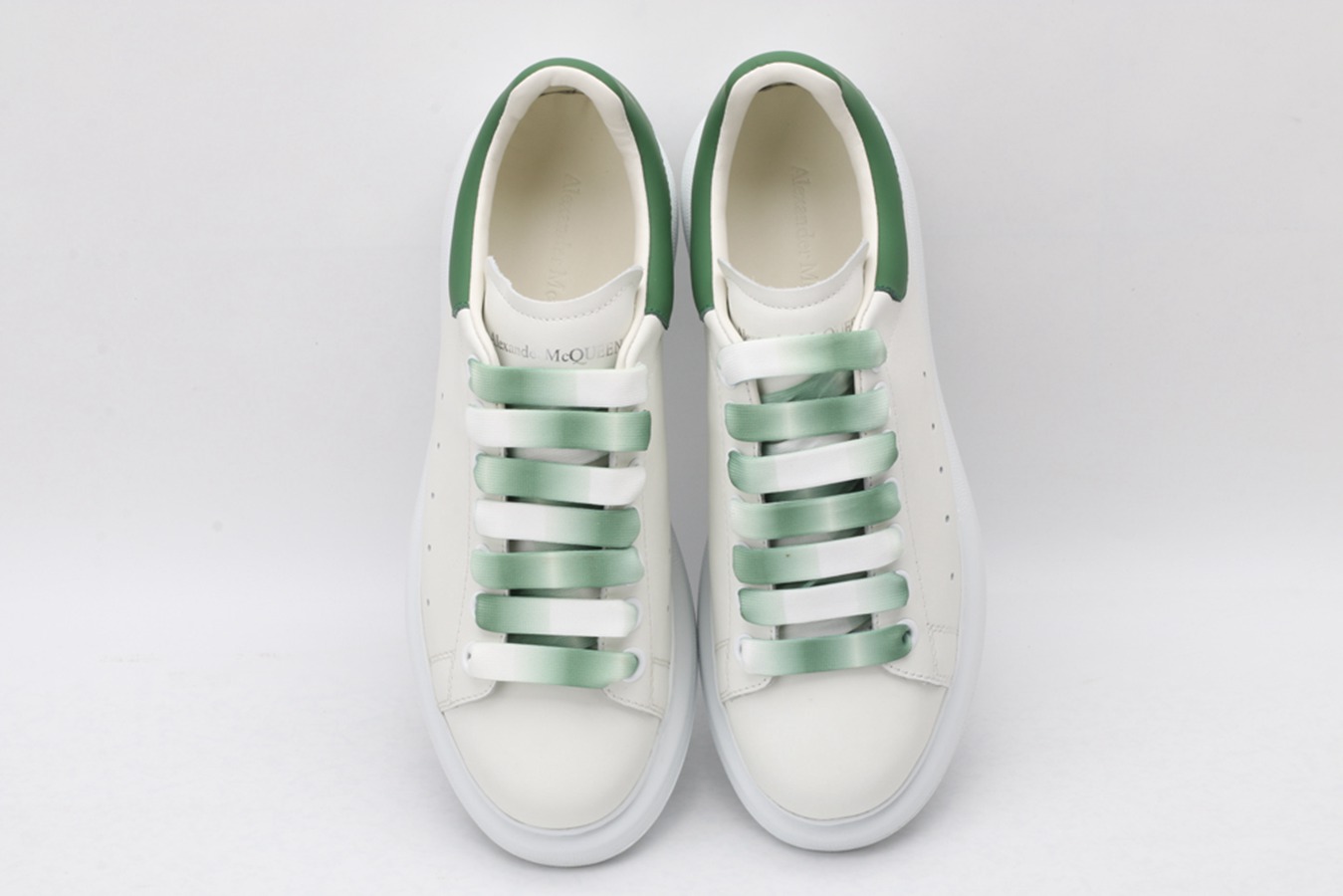 AMQ oversized sneakers with green heel