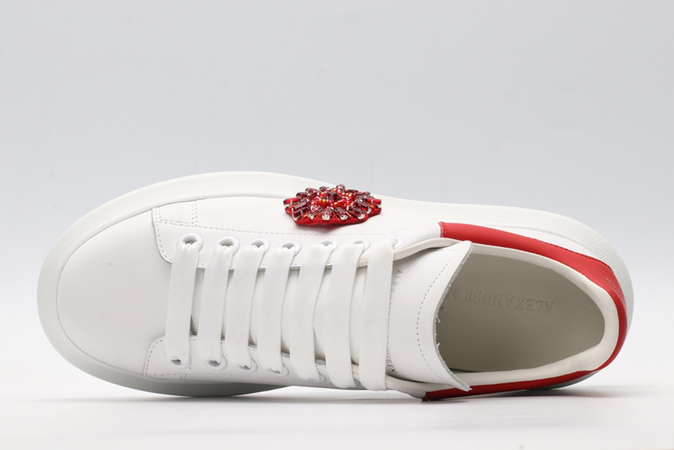 AMQ oversized sneakers with red heel