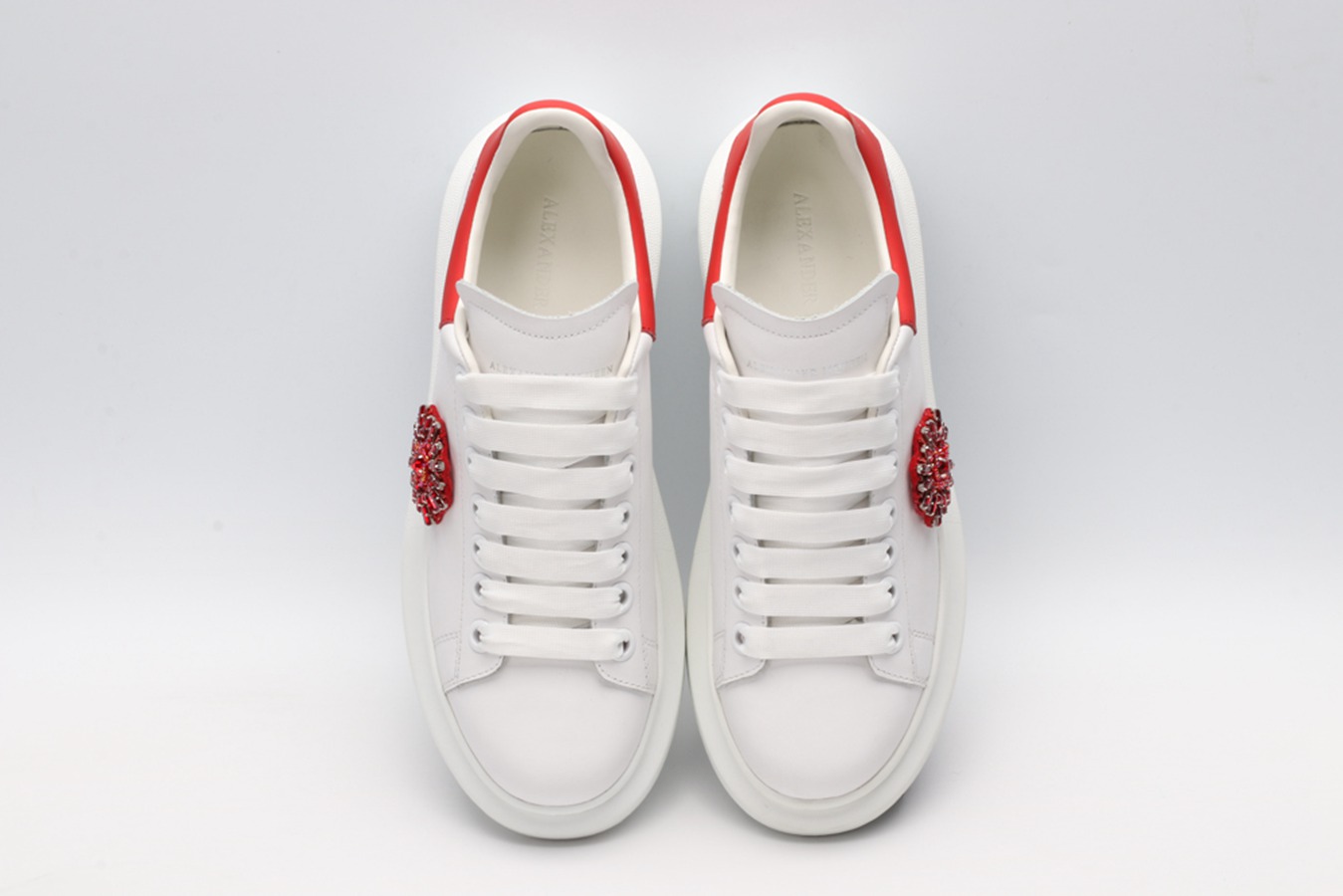 AMQ oversized sneakers with red heel