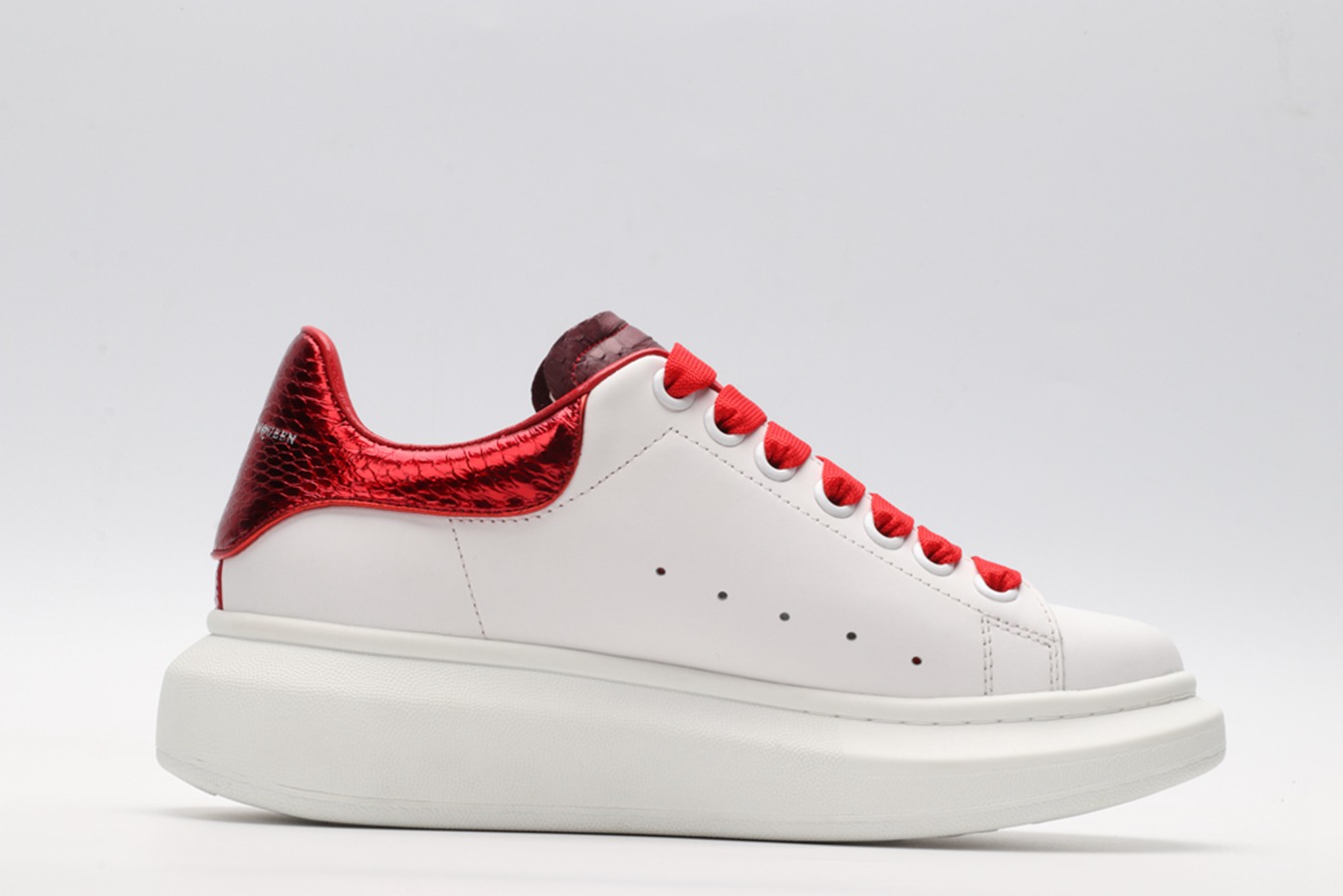 AMQ oversized sneakers with red heel