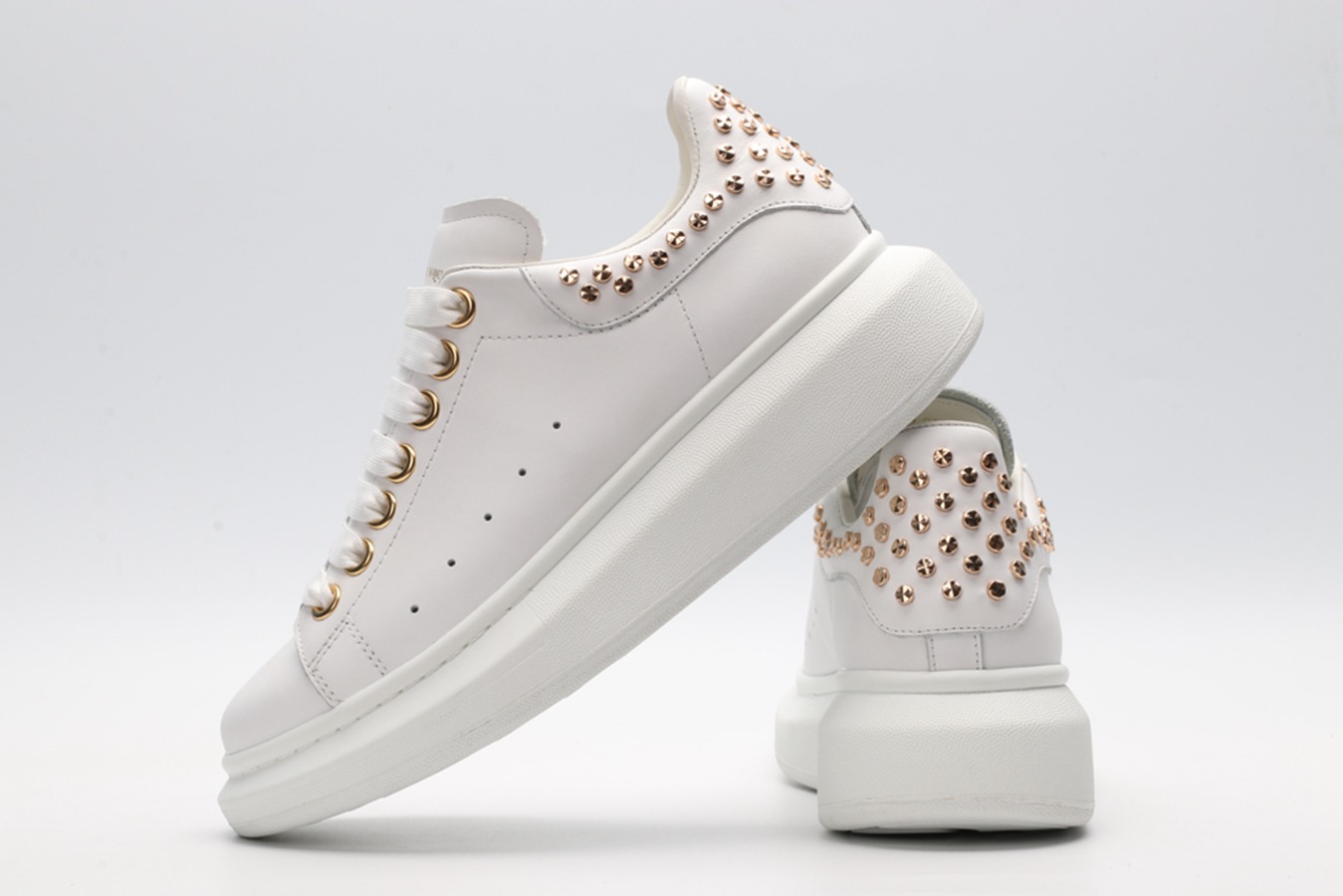 White calf leather lace-up sneaker with gold-finished hammered stud