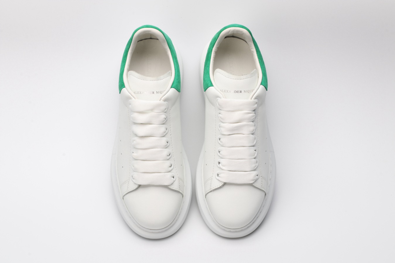 AMQ OVERSIZED SNEAKER with green heel