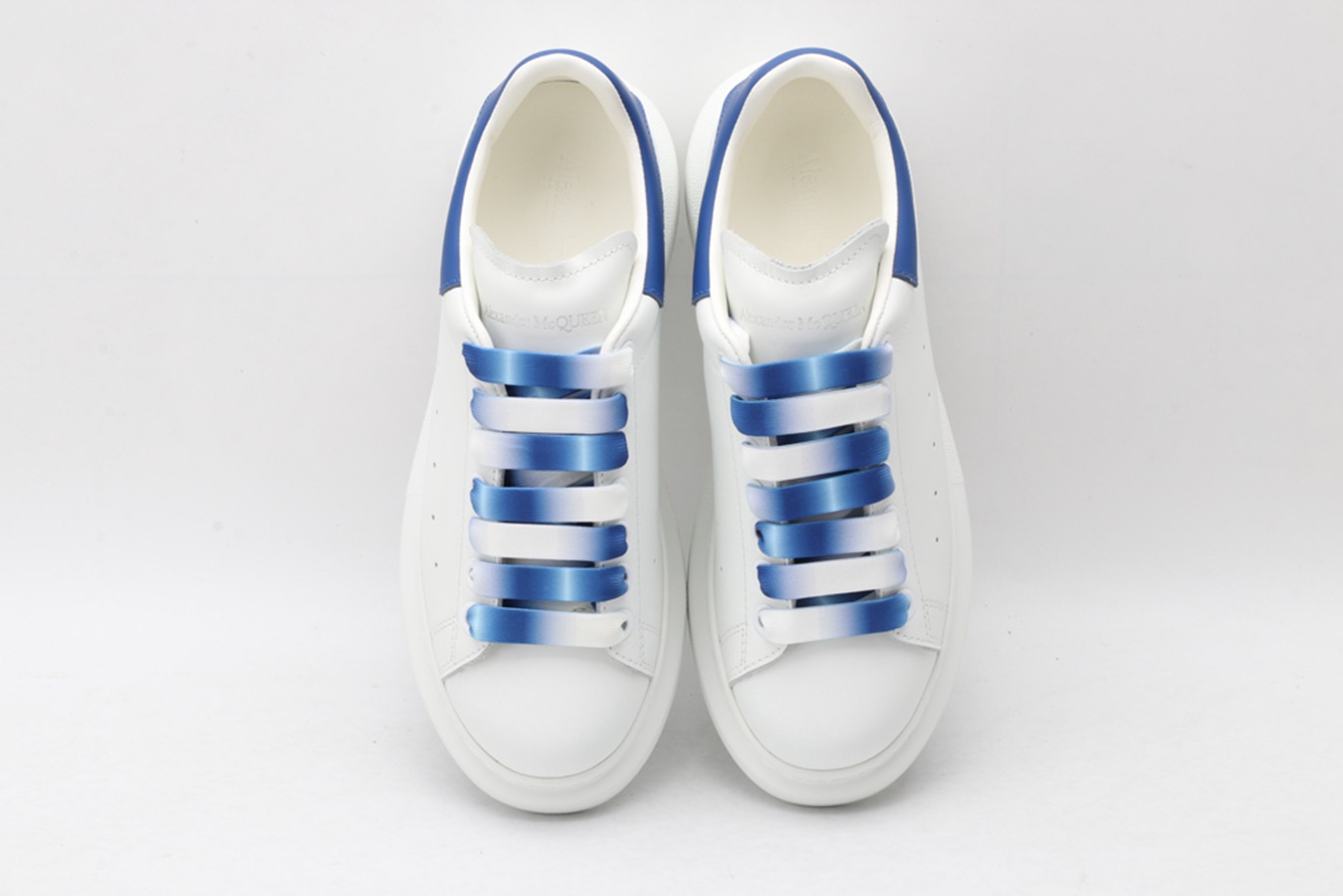 AMQ oversized sneakers with blue heel