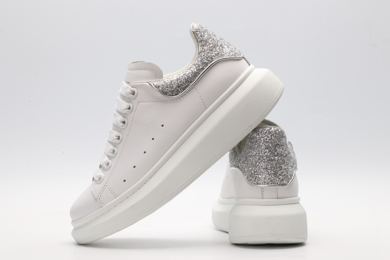 AMQ oversized sneakers with siL*Ver heel