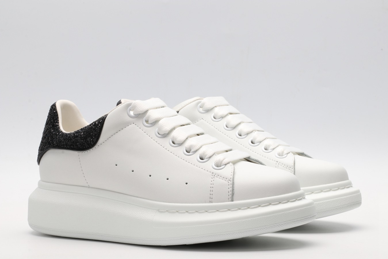 AMQ oversized sneakers with black heel