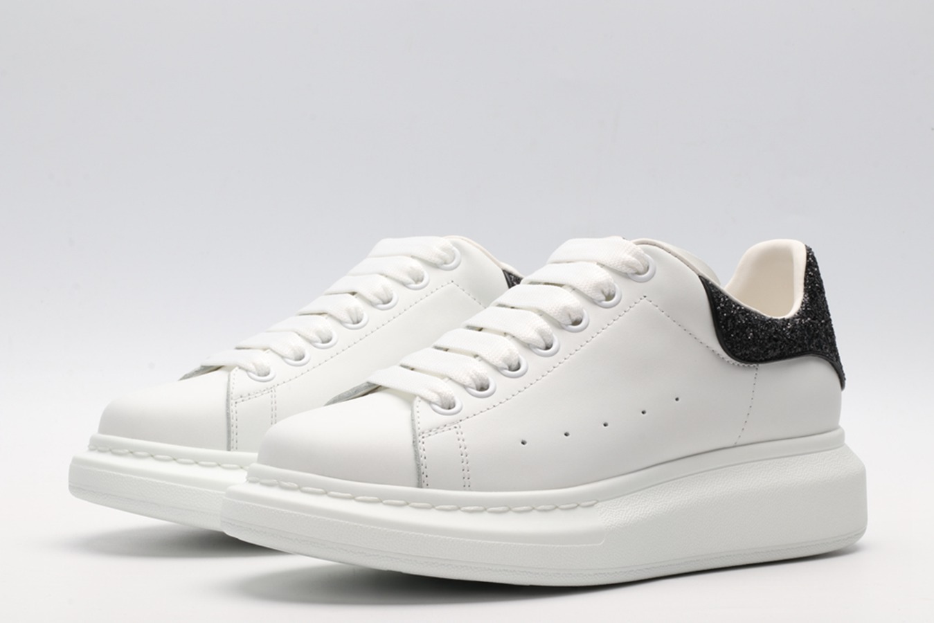 AMQ oversized sneakers with black heel