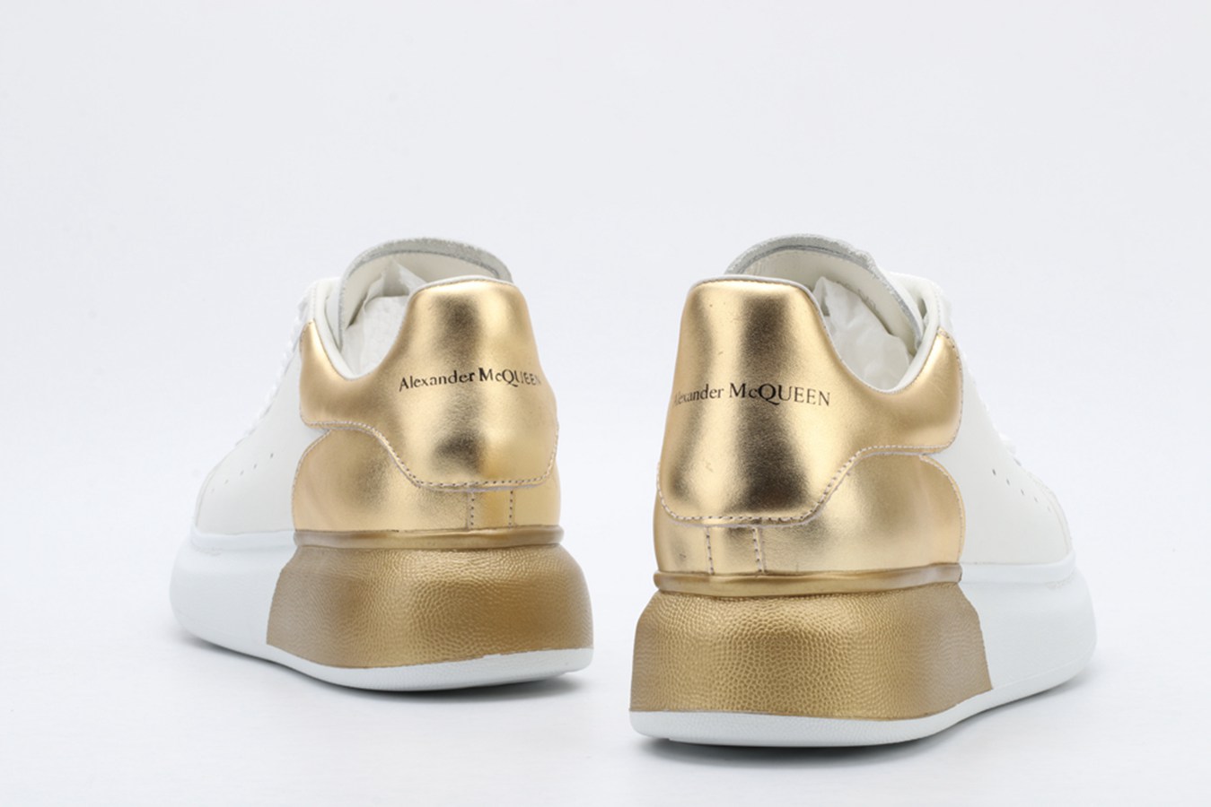 AMQ oversized sneakers with gold heel