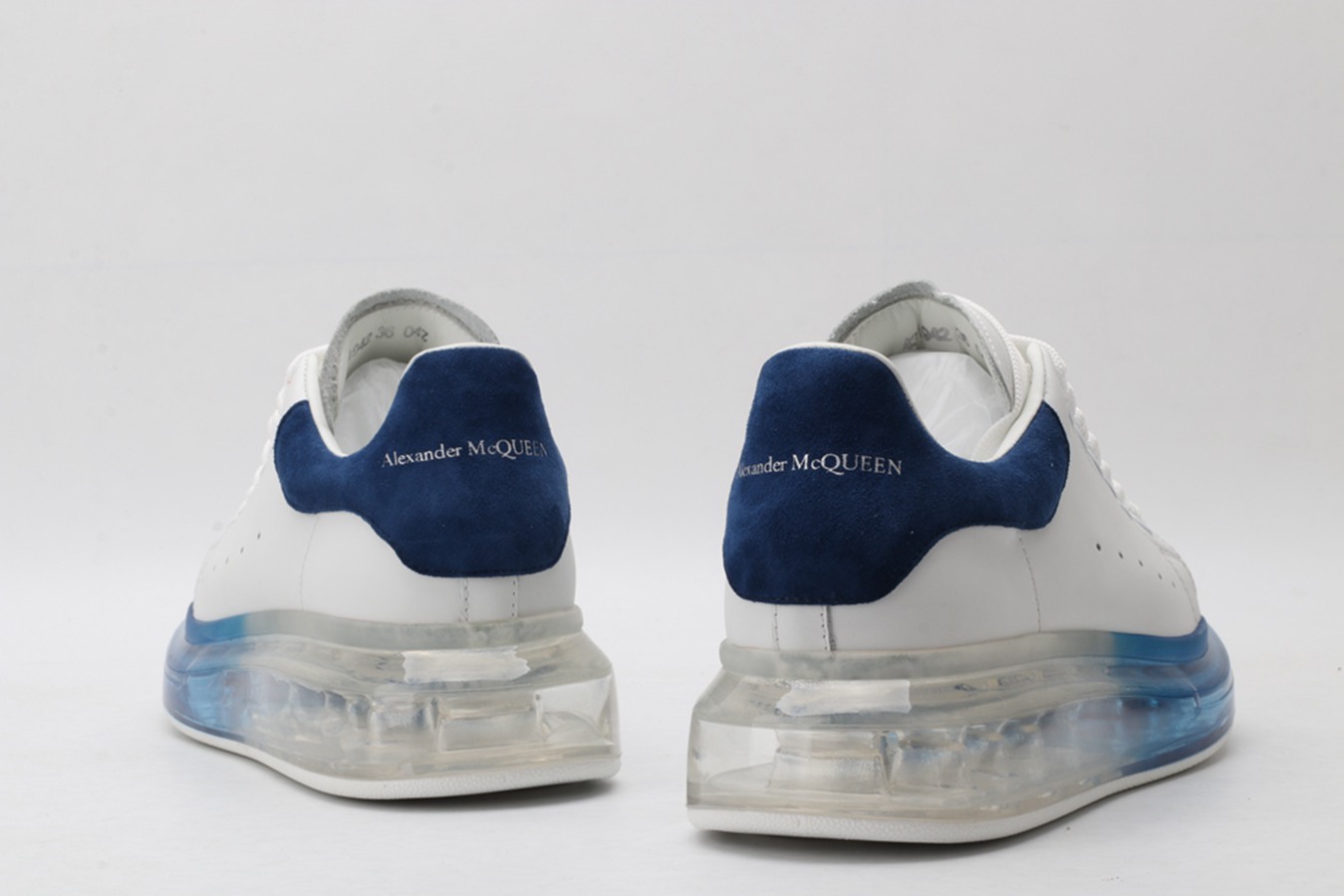 AMQ white oversized sneakers with blue heels