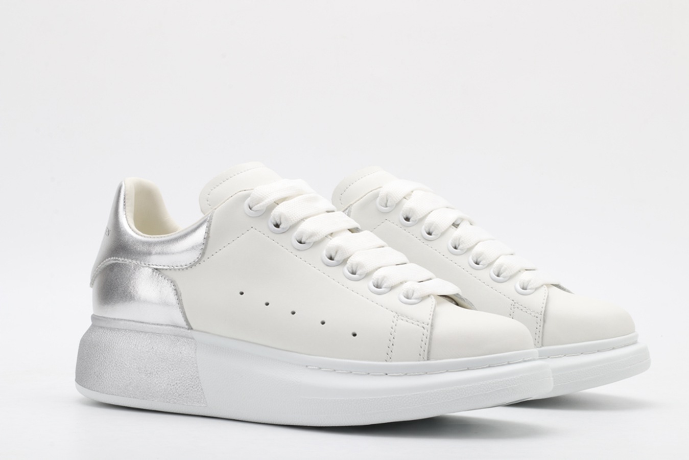AMQ oversized sneakers with siL*Ver heel