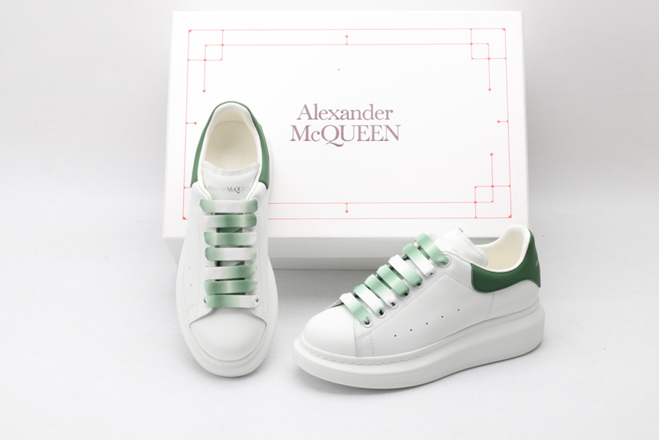 AMQ oversized sneakers with green heel
