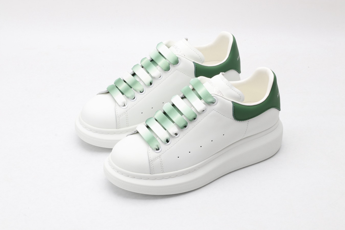AMQ oversized sneakers with green heel