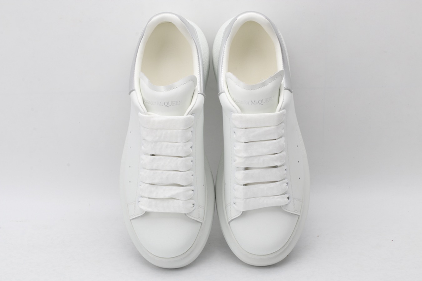 AMQ oversized sneakers with siL*Ver heel