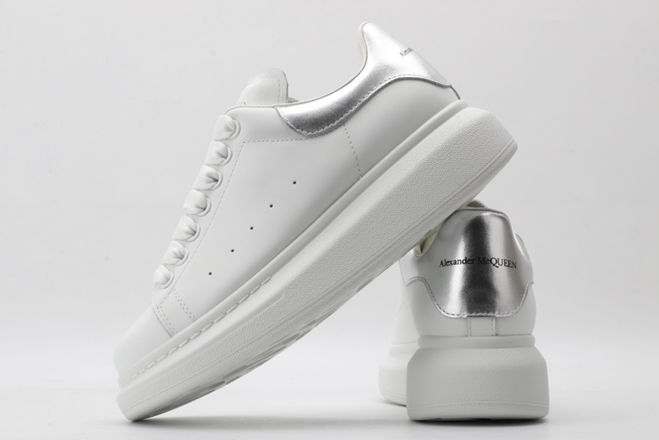 AMQ oversized sneakers with siL*Ver heel