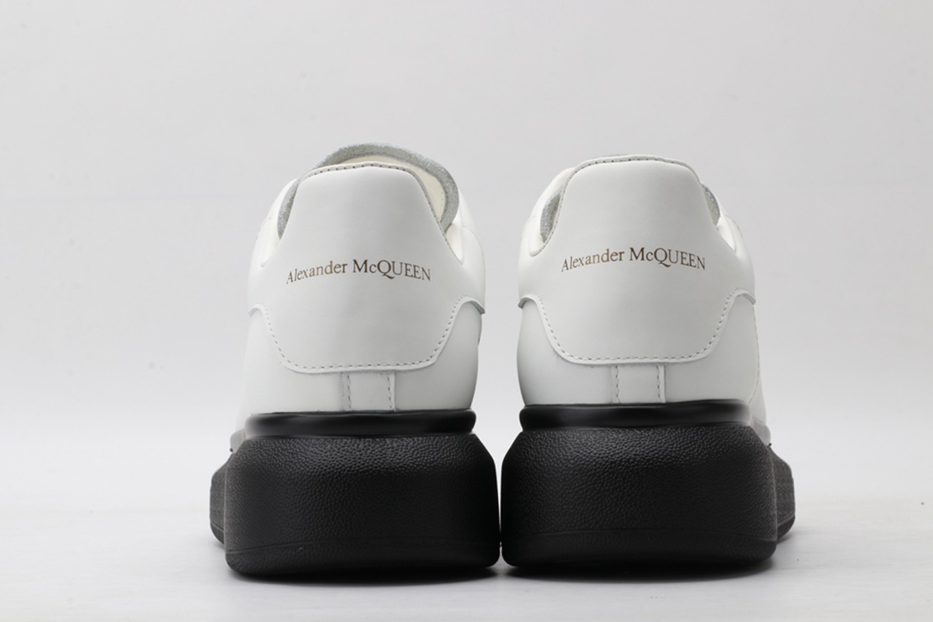AMQ White & Black Oversized Sneakers