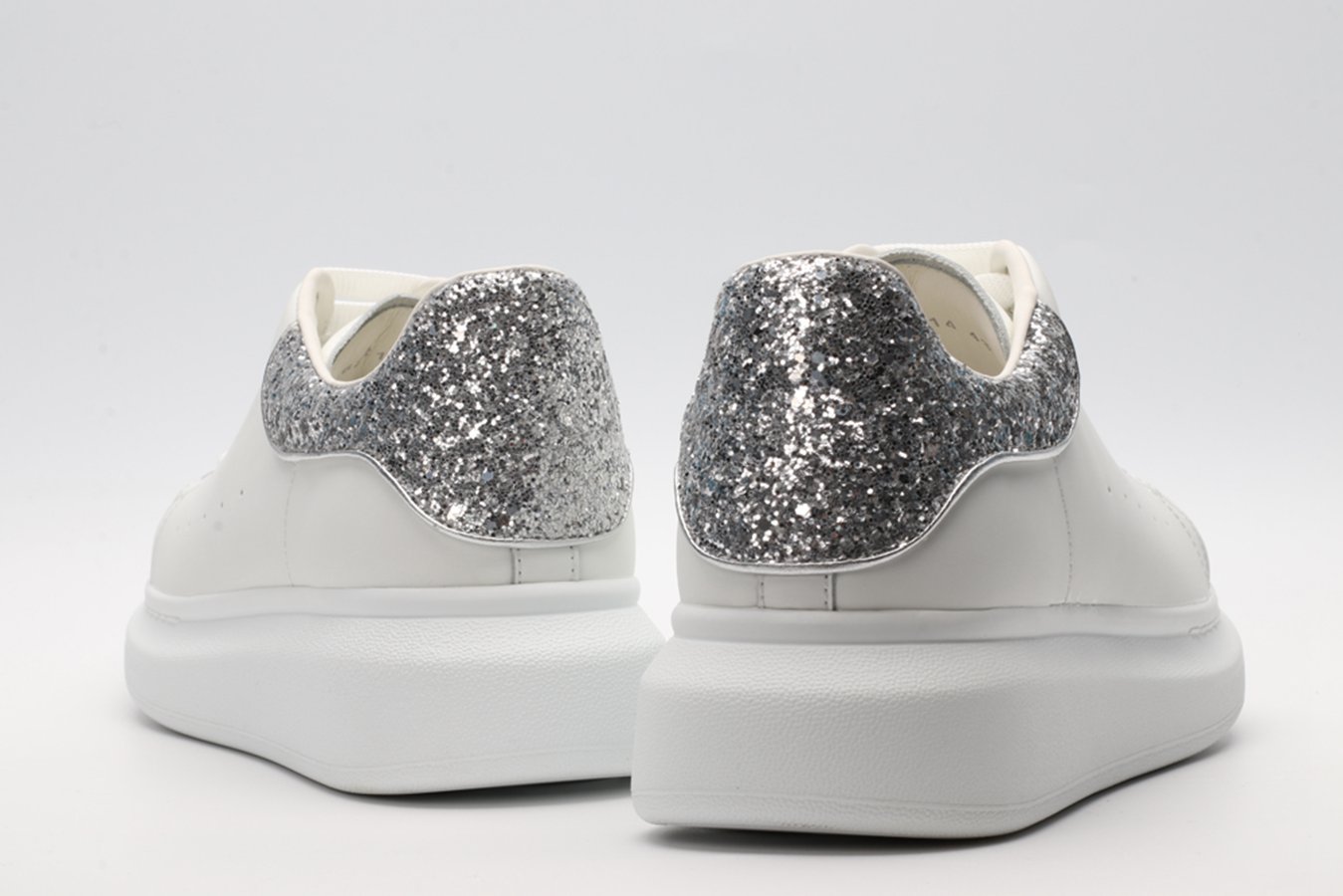 AMQ oversized sneakers with siL*Ver heel
