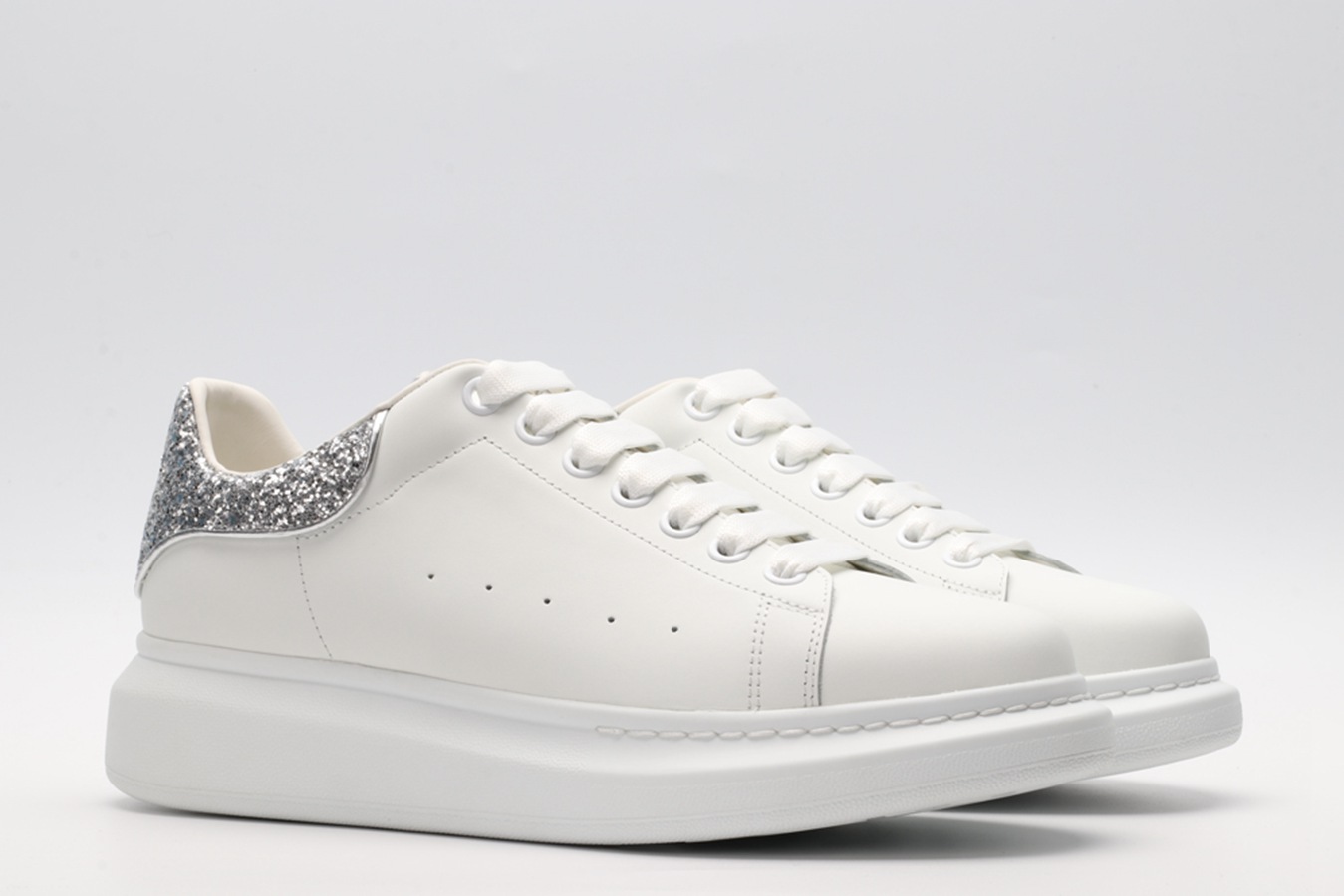 AMQ oversized sneakers with siL*Ver heel