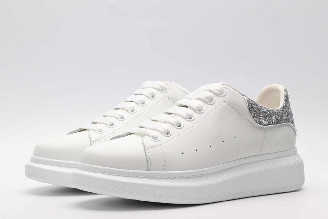 AMQ oversized sneakers with siL*Ver heel